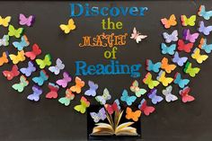 an open book with butterflies on it and the words discovering the magic of reading