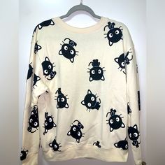 Hello Kitty, Cream Choco Cat Sweater, Never Worn Brand New Without Tags, Size Medium Casual Winter Tops With Cat Print, Winter Cotton Top With Cat Print, Casual Cat Print Sweater For Winter, Casual Winter Sweater With Cat Print, Casual Long Sleeve Tops With Cat Design, Cute Long Sleeve Sweatshirt With Cat Design, Cute Long Sleeve Sweatshirt With Cat Print, Fall Cat Print Crew Neck Top, White Cat Design Top For Winter