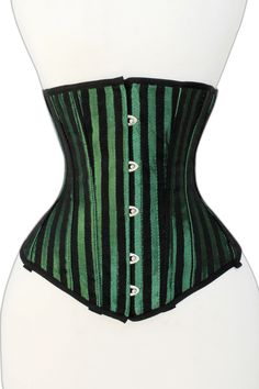 This Green Lacemade corset is suitable for tight-lacing, Waist training, and shaping, making it a valuable choice for attaining the shape and look desired Additionally, superiority of lumbar, central, and lower back support is guaranteed by the Steel Boned Brocade Corset, likely leading to a straightening of posture with consistent use. Green Lacemade corset Features: Style: Longline, Half bust Corset Features: Cord Lacing, Hip Gores, Steel Busk Color: Green Achievable Waist Reduction: 4-5" Poin Fitted Gothic Green Corset, Green Corset With Boned Bodice, Green Corset With Boned And Fitted Bodice, Fitted Underbust Corset With Medium Bust Support, Brocade Corset, Corset Look, Black Leather Corset, Structured Corset, Corset Looks