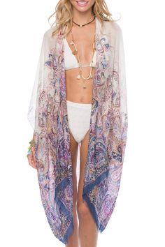 Our Kimono wrap in Fairytale Paisley will sweep you off your feet. The versatility of this piece will make for the perfect addition to your wardrobe. Wear it over your swim suit of pair it with an A La Slip for the perfect beachy look. One-Size fits most. 60% Modal/ 40% Viscose - Luxury Collection Pool to Party label SALE ITEMS ARE FINAL SALE Summer Floral Print Wrap Cover-up, Festival Boho Print Beachwear Cover-up, Bohemian Lightweight Cover-up For Beach Party, Beachy Printed Pool Cover-up, Floral Print Wrap Beachwear Cover-up, Bohemian Open Front Swimwear For Summer, Bohemian Open Front Summer Swimwear, Bohemian Printed Swimwear For Beach, Bohemian Open Front Swimwear For Beach Season