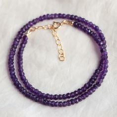 Want to save 15% off your first order? Sign up for our newsletter by visiting our website and filling out the pop up form. Receive a code by email, then send us that code through Etsy messages to save 15% off your ETSY order, sign up here: www.earthlyabundancejewelry.com  Amethyst: connection, soothing, healing D E T A I L S △ Handmade in Canada △ Genuine African Amethyst △  Length is 15-17" (adjustable) △ Stone size 4mm [faceted cut] △ 14K gold filled clasp and extender  △ Gemstones are 100% ge Purple Rondelle Gemstone Beads, Purple Amethyst Faceted Bead Crystal Necklaces, Purple Round Bead Gemstones For Gifts, Purple Amethyst Crystal Necklaces With Faceted Beads, Purple Faceted Amethyst Crystal Necklaces, Purple Amethyst Necklace With Faceted Beads, Purple Amethyst Crystal Necklace With Faceted Beads, Amethyst Crystal Necklace With Faceted Beads As Gift, Purple Faceted Amethyst Crystal Necklace