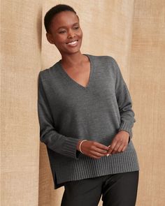 A something-special V-neck sweater, in EILEEN FISHER's signature merino wool that's expertly spun in Italy and knit with a smooth stitch that's lovely on its own, as a layer, or as a backdrop for accessories. Designed just for us with a boxy silhouette, ribbed accents, and side vents for a bit of swing.  By EILEEN FISHER exclusively for Garnet Hill. Long sleeves. Rib-knit detail at the cuffs and hem. Chic Wool V-neck Fine Knit Sweater, Merino Wool V-neck Sweater For Layering, Elegant Merino Wool V-neck Sweater For Fall, Merino Wool V-neck Sweater For Work, Elegant Soft Knit V-neck Sweater For Layering, Elegant V-neck Sweater For Layering In Fall, Elegant V-neck Soft Knit Sweater For Fall, Elegant Fine Knit V-neck Sweater, Elegant Merino Wool V-neck Sweater For Layering