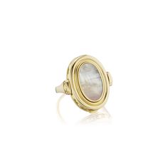 Available in 14k Yellow or 18k Yellow Gold, the Motif Varia Ring is large in scale with generous heft. Not only is it beautiful, but it is also functional. It secretly opens for interchangeability! Choose from Mother of Pearl or Black Onyx CenterPendants, which are reversible. The back of either style is gold for hand engraving a monogram (included in the purchase). This ring is currently made to order. Please allow 4-6 weeks for engraving and delivery. Once your order is placed, we will contact Gold Centerpiece, Gold Centerpieces, Hand Engraving, Signet Ring, Cocktail Rings, Black Onyx, Sapphire Ring, Mother Of Pearl, Onyx