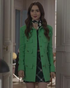 Lily Collins Emily in Paris Green Coat From French fashion to aesthetically pleasing scenery and cinematography, Emily in Paris has become a staple watch for many and is one of the most successful and well-liked Netflix series. Starring Lily Collins, the series shows us the life of Emily as she finds popularity and success and develops a career while being kind and humble and staying true to herself. Being seen as a fashion icon, her unique high-end style has gone viral and is making the rounds on the internet, inspiring many. Introducing Emily in Paris coat, adorned by Lily Collins in the series, an outerwear made for enthusiasts who are keen to make a bold fashion statement. Available in the color green, it is a unique and standout addition to your closet and is not only visually stunnin Emily Cooper Outfits, Lily Collins Emily In Paris, Emily In Paris Inspired Outfits, Green Coat Outfit, ليلي كولينز, Emily In Paris Fashion, Red Jacket Leather, Emily In Paris Outfits, Lily Collins Style