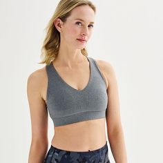 An activewear staple. Train in comfort with this medium-impact sports bra from Tek Gear.An activewear staple. Train in comfort with this medium-impact sports bra from Tek Gear.PRODUCT FEATURES Perfect for medium-impact activities Moisture-wicking technology Jersey construction Racerback V-neckFIT & SIZING Removable bra cups Wire freeFABRIC & CARE Polyester, spandex Machine wash Imported Color: Charcoal. Gender: female. Age Group: adult. Petite Size Chart, Womens Size Chart, Free Fabric, Bra Cups, Heather Black, Petite Size, Polyester Spandex, Fabric Care, Gender Female