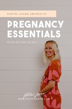 a woman standing in front of a white wall with the words pregnant essentials on it