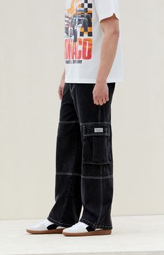 Step into bold style with the PacSun Black Extreme Baggy Cargo Jeans. Boasting side, traditional back, and large cargo pockets with a woven PacSun tag, these jeans are both functional and fashionable. With contrast stitching and an extreme baggy fit leading to a wide leg opening, these jeans redefine streetwear with a statement-making look.


	Model is wearing size 32
	Model Measurements: 6'0” Height, 28" Waist, 34” Chest, 32” Hips


Learn more about PacSun eco items Baggy Cargo Jeans, Jeans Pacsun, Bold Style, Cargo Jeans, Baggy Fits, Contrast Stitch, Bold Fashion, Model Measurements, Pacsun