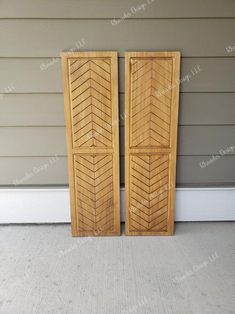 two wooden doors sitting next to each other