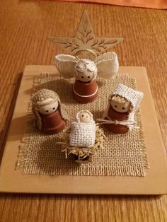 three little sheeps are sitting on top of a mat