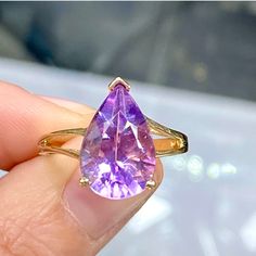 10k Yellow Gold 5 Carat Pear Shape Amethyst Ring - Teardrop Birthstone Ring New! Never Worn! Retail Price - $339 Solid 10k Yellow Gold Total Weight - 5 Carats Natural Amethyst - Stunning Color! Size - 9, Can Be Sized To Fit You February Birthstone Gift Box & Jewelry Polishing Cloth Included #0801120 Stunning Pear Shaped 5 Carat Genuine Amethyst Gemstone In A 10k Yellow Gold Split Shank Ring. Solid Gold, Natural Gemstone, Genuine Diamonds. Big Look! Perfect Cocktail, Dinner, Statement, Fashion Or Pear Shaped Amethyst Ring, Amethyst Engagement Ring Gold, Chrome Hearts Ring, Lavender Stone, Ring Teardrop, Square Jewelry, Cocktail Dinner, Amethyst Ring Engagement, Purple Rings