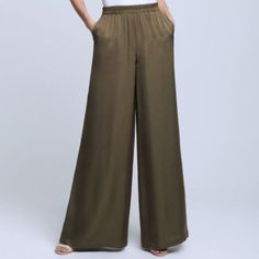 Go By Go Silk Olive Ivy Green Wide Leg Trouser Pants, Size 3 New With Tags - Elastic Waist - Wide Leg Trouser - Belt Loops -Wide Leg -100% Silk Measurements Are Approximate & Are Done Laying Flat: - Waist: 15 Inches - Rise: 14 Inches - Inseam: 27 Inches - Leg Opening: 10 Inches Offers Welcome! Chic Olive Summer Pants, Olive High-waisted Pants For Spring, Chic Olive High Waist Bottoms, Spring Khaki Wide Leg Full-length Pants, Chic Olive Bottoms For Spring, Olive High Waist Bottoms For Summer, Olive High-waist Bottoms For Summer, High Waist Olive Bottoms For Summer, High-waisted Olive Bottoms For Summer