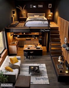 a loft bedroom with stairs leading up to the bed