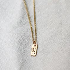 Keep your loved ones over your heart with this unique handmade piece. Customize with three lines of 2 characters - add a special date or meaningful initials. Each letter is individually hand-stamped, making each necklace one of a kind. details+ itty-bitty tag pendant measures 4mm wide x 6mm tall+ on model : 16 & 18" adjustable necklace+ s hook closure+ handmade with love in our Georgia studio availability handmade to order. ships in 5 - 14 days.current production timeline pressed for time? selec Customized Adjustable Necklace For Everyday, Customized Adjustable Necklaces For Everyday, Adjustable Stamped Necklace For Everyday Wear, Adjustable Stamped Necklaces For Everyday, Everyday Adjustable Hand Stamped Charm Necklaces, Adjustable Hand Stamped Charm Necklace For Everyday, Minimalist Customized Necklaces For Everyday Wear, Minimalist Customized Necklaces For Everyday, Customized Minimalist Necklace