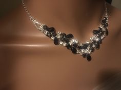 "Black Bridal jewelry set, Black , Silver Necklace with Earring, wedding jewelry set, Bridesmaid Crystal Rhinestone Jewelry, Teardrop Crystal Floral Rhinestone Necklace Color : Black, Silver Necklace Size : 14\" + 5.5\" L Decor Size : 1.5\" L Earring Size : 1.75\" L Please contact us for any special custom order ." Black Rhinestone Necklace, Black Dimond Neckless Jewelry, Black Diamond Jewelry Set, Black Rhinestone Jewelry For Wedding, Black Rhinestone Wedding Jewelry, Elegant Black Jewelry Set For Wedding, Elegant Black Bridal Necklace For Formal Occasions, Black Crystal Jewelry Sets For Wedding, Black Jewelry With Sparkling Stones For Wedding