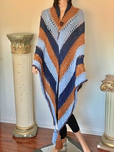 "I Designed and Hand Knitted this Generous Size Triangle Luxurious Shawl. Denim Shades of Blues and Rusty Brown ( Whiskey) colors came together yo create this Bohemian / Rustic Piece! Each corner of the Shawl ends in Big Tassel/ Fringe. Measures: Each bottom angle : 74\" Top/ neck & shoulders 110\" Each Tassel/ Fringe 8\" Soft and luxurious feel to the touch. Wear this Beauty all 4 Seasons and it will be focal point of your outfit! Designed and Hand Knitted by me in California, USA! See All of M Chic Christmas Gifts, Hand Knits, Triangle Shawl, Red White Christmas, Love Triangle, Triangle Shawls, Love Hat, Shawl Pins, Original Fashion