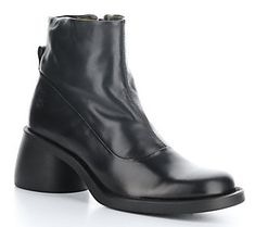 Crafted in durable leather, this two-tone boot bolsters your step with a comfy insole and a stable block heel. From Fly London. Modern Chelsea Boots With Stacked Heel And Round Toe, Modern Leather Mid-calf Boots With Block Heel, Modern Chelsea Boots With Sculpted Heel, Modern Round Toe Boots With Stacked Heel, Modern Boots With Reinforced Block Heel, Modern Boots With Block Heel And Reinforced Heel, Ankle Boots With Rubber Heel Cap Medium Width, Ankle Boots With Rubber Heel Cap, Modern Mid-calf Boots With Reinforced Heel And Round Toe