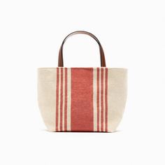 Zara Fabric Mini Tote Bag Brand New With Tag Fabric Tote Bag With A Striped Print On The Exterior Crossbody Strap. Zip Closure Height X Length X Width 16 X 25 X 12 Cm / 6.2 X 9.8 X 4.7" Outer Shell Main Fabric 100% Cotton Shoulder Strap 100% Polyethylene Lining 100% Cotton Zara Everyday Use Bucket Bag, Zara Bucket Bag For Everyday Use, Red Bucket Bag With Top Carry Handle, Red Canvas Bags For Summer, Zara Bucket Bag With Removable Pouch For Everyday, Zara Bucket Bag For Shopping, Red Shoulder Bag With Rolled Handles For Shopping, Red Summer Bags For Errands, Casual Bags With Rolled Handles For Errands