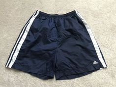 ITEM IS IN PRE OWNED GOOD USED CONDITION. NICE CLASSIC COLORWAY AND LOGO CHECK PHOTOS FOR MEASUREMENTS AND A SURE FIT. PRE OWNED ITEMS CAN VARY IN SIZE. PLEASE CHECK OUT OUR OTHER LISTINGS! WE RESPOND TO QUESTIONS AS SOON AS POSSIBLE. WE POST DAILY!  WE SHIP DAILY! Adidas Athletic Shorts With Logo For Streetwear, Sportswear Shorts With Three Stripes Branding For Sports Events, Adidas Casual Shorts For Sports Events, Casual Adidas Shorts For Sports Events, Casual Three Stripes Shorts For Sports Events, Adidas Casual Athletic Shorts For Jogging, Casual Adidas Shorts For Jogging, Sporty Athletic Shorts With Pockets For Sports Events, Adidas Athletic Shorts For Gym With Three Stripes Branding