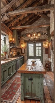 an old fashioned kitchen with wooden floors and green cabinets, chandelier above the island