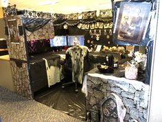 a room decorated for halloween with decorations on the walls