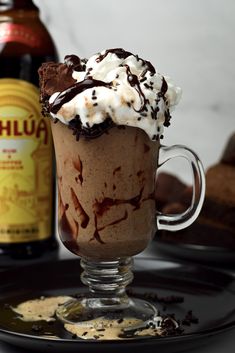 there is a chocolate drink with whipped cream on top