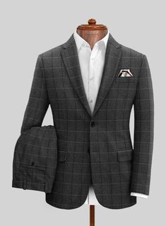 Our Italian Serto Checks Tweed Suit helps you nail the traditionally inspired look with modern energy, which regularly features in formalwear collections. Crafted from a wool blend with a black hue that gives classic design elements lending a level of richness to your formal look. The suit showcases a checks pattern and herringbone design known for its broken zigzag pattern and for its resemblance to a fish’s skeleton. Style it up for a wedding or down for workwear.  Look features a 2 button jac Elegant Single-breasted Tweed Suit, Elegant Tailored Tweed Blazer, Elegant Tweed Three-piece Suit With Notch Lapel, Tailored Timeless Tweed Blazer, Timeless Tailored Tweed Blazer, Formal Tweed Blazer With Suit Collar, Tailored Wool Tweed Jacket With Pressed Crease, Elegant Tweed Suit With Herringbone Pattern, Luxury Fitted Tweed Jacket With Welt Pockets