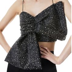 New With Tags Alice And Olivia Beline Embellished Bow Crop Top, Black - Retail $660 Size Info If Ordering Alice + Olivia For The First Time, Order One Size Up. Details & Care A Skin-Baring Crop Top Is Defined By A Large Bow Encrusted With Sequins That Shine As Bright As A Disco Ball. V-Neck Spaghetti Straps 100% Polyester Dry Clean Imported Model Stats: 5'10" Height, 32" Bust, 25" Waist, 36" Hip. Luxury Sleeveless Tops For Evening, Chic Embellished Evening Tops, Chic Black Tops For Gala, Luxury Evening Tops For Summer, Luxury Summer Evening Tops, Luxury Black Evening Tops, Designer Sleeveless Party Tops, Designer Sleeveless Tops For Evening, Embellished Black Tops For Cocktail