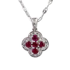 Flower in bloom, round rubies and a halo of bead set round diamonds are featured in this intricately crafted pendant. Gottlieb & Sons Ken Walker, Gig Harbor Wa, Gig Harbor, Bead Set, In Bloom, Jewelry Store, Jewelry Stores, Round Diamonds, Jewelry Pieces