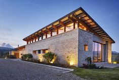 a large house with lights on the outside