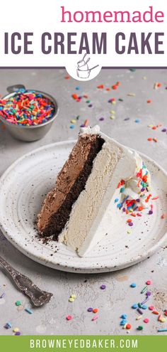 a slice of ice cream cake on a plate with sprinkles around it