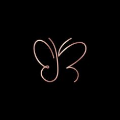 the letter k is made up of thin pink lines on a black background, and it appears to be handwritten in cursive writing