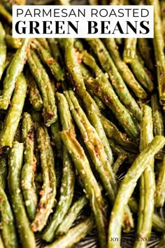 green beans are sitting on a silver plate and ready to be cooked in the oven