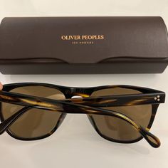 Oliver Peoples, Brown, Cocobolo Brown, New With Tags: A Brand-New, Unused, And Unworn Item (Including Handmade Items) In The Original Packaging (Such As The Original Box Or Bag) And/Or With The Original Tags Attached, Polarized Cr-39 Brown, Acetate, And Metal. Oliver Peoples Daddy B 55mm Polarized Sunglasses Size: 55-19-145mm (Eye-Bridge-Temple) - Frame Color: Cocobolo - Lens Color: Brown - Frame Material: Plastic - Protection: 100% Uv - Made In Italy Classic Brown Sunglasses For Travel, Formal Brown Wayfarer Sunglasses, Formal Brown Sunglasses With Gradient Lenses, Classic Leather Sunglasses With Gradient Lenses, Michael Weston, Oliver Peoples Sunglasses, Oliver Peoples, Black Sunglasses, Aviator Sunglasses