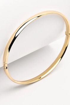 Buy a unique bangle bracelet for women. | Discover a large collection of everyday sparkling jewels. | ✅ We offer FREE Worldwide Shipping. Classic 14k Gold Hoop Bracelet, Elegant 14k Gold Hoop Bangle, Classic Gold Hoop Bracelet For Formal Occasions, Elegant Hoop Bangle With Polished Finish, Minimalist Yellow Gold Oval Bracelet, Classic Oval Bangle As Gift, Classic Gold Bracelet With Shiny Finish, Classic Oval Bangle For Formal Occasions, Elegant Gold Hoop Bracelets