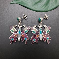 Visit our online shop at: Etsy.com/shop/925ForHer *sterling silver earrings / butterfly shape *studs / post earrings *southwestern jewelry *multicolor inlay / pattern inlay *calibrated pre-cut stones: inlay including mother of pearl, spiny oyster, malachite, sodalite *back of jewelry items are all covered / do not show the back of stones *all jewelry items are made to ship, slight variations in stones will occur compared to pictures. *size of a penny is 19mm or a dime is 18mm in diameter for comparing the size with jewelry items. *handcrafted in the USA *free small convenient gift box *free shipping in the US, ship from the US without insurance. *most orders will be shipped the same day or within 24 hours from the time of placing orders during USPS working hours. *seller provide one-time F Multicolor Sterling Silver Earrings For Gift, Nickel-free Multicolor Sterling Silver Earrings, Multicolor Sterling Silver Nickel-free Earrings, Multicolor Butterfly Earrings For Pierced Ears, Multicolor Sterling Silver Drop Earrings, Multicolor Butterfly Charm Earrings As Gift, Multicolor Butterfly Charm Earrings, Sterling Silver Earrings With Butterfly Charm, Multicolor Butterfly Earrings