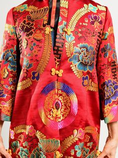 "Chinese Brocade Jacket/ Chinese Embroidered Opera Coat/ Chinese Embroidered Jacket/ Red Satin Jacket/ 60's Chinese Coat/ Size S-M Incredible satin Chinese jacket in the most vibrant hues. Bold red with multi-colored embroidery accentuated by yellow frog closures. In excellent condition. A collector's item. Fully lined. Size tag reads size 10. Model is 5'4\" and a size 4 for scale. Please see exact measurements below. Item measured while flat, double where applicable, i.e. waist, hips. Shoulder Chinese Jacket, Chinese Brocade, Greek Goddess Dress, Brocade Jacket, Chinese Embroidered, Beach Caftan, Opera Coat, 70s Maxi Dress, Capes & Ponchos