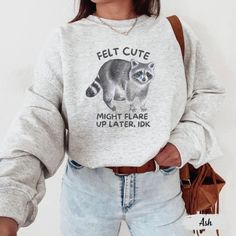 Stay comfy and cheeky in this "Felt Cute, Might Flare Up Later IDK" sweatshirt--perfect for anyone with a hidden disability or chronic illness who rocks life with humor! Whether you're managing POTS, fibromyalgia, or chronic pain, this sweater is a fun and empowering gift for those who understand the ups and downs of living with a flare-up. Prefer this design on a T-Shirt? Visit this link:  Everything You Need to Know: 🧥 Sweatshirt Brand Gildan | Unisex Adult Sizing | 50% Cotton, 50% Polyester ⏳🚚 Production & Shipping All items are made-to-order. They will ship within 1-5 business days from one of our printing partners, shipping usually takes between 2-5 business days after the item is shipped. Please allow sufficient time for production and shipping.  Important: Please double-check your Managing Pots, Branded Sweatshirts, Ups And Downs, Chronic Illness, Chronic Pain, Sweatshirt Fashion, Unisex Sweatshirt, Bathing Beauties, Adult Outfits