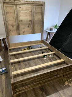 the bed frame is made up and ready to be put into place in the room