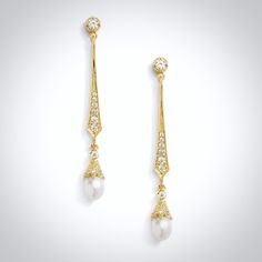 Delicate and shining brightly, this pair of earrings can complete the most sophisticated of looks. All it takes is a simple glance to see this extremely classy look that makes a glamorous and feminine statement. Adorned with iridescent teardrop pearls and flawless cubic zirconia that captures the light from every angle with a perfectly translucent appeal, the earrings are rhodium / rose gold / yellow gold plated for a flawless finish which perfectly enhances the intricate detailing and conveys a Elegant Metal Linear Earrings For Evening, Elegant Metal Clip-on Earrings For Anniversary, Elegant Metal Linear Earrings For Formal Occasions, Elegant Metal Teardrop Earrings, Elegant Metal Pearl Drop Bridal Earrings, Elegant Metal Bridal Earrings With Pearl Drop, Elegant Metal Teardrop Earrings With Pearl Drop, Classic Rose Gold Earrings With Elegant Design, Elegant Metal Pearl Earrings For Pierced Ears