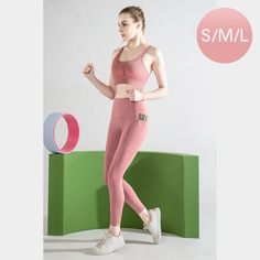 Size: S/M/L Material : 75% Nylon, 25% Spandex Designed for Training Sweat-Wicking Four-Way Stretch Breathable, Smooth and Cool Feel Banded High Waist Tights with side and waist pockets, sports bra with back pocket Size of Model: Height 5'10; Wearing Size S High Stretch Nylon Yoga Pants For Sports, Pink Breathable Elastane Activewear, Pink Nylon Activewear For Pilates, Pink Elastane Sports Bra, Pink Elastane Sports Bra For Workout, Pink 4-way Stretch Activewear For Sports, Pink Elastane Sports Activewear, Fitted Nylon Yoga Pants For Sports, High Stretch Pink Nylon Activewear