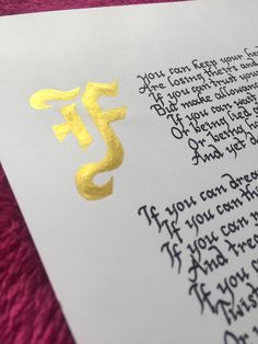 a close up of a piece of paper with writing on it and an image of the letter f