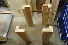 several pieces of wood sitting on top of a floor