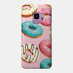 a pink phone case with donuts on it