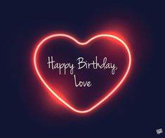 a heart shaped neon sign with the words happy birthday love