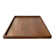 an empty wooden tray on a white background