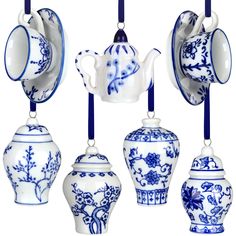 blue and white porcelain teapots hanging from hooks