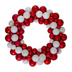 a red and white christmas ornament wreath on a white background with balloons in the shape of a letter o