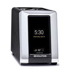 Offering a more precise and consistent heating experience, Revolution InstaGLO toasters have transformed the process of toasting bread, using a fraction of the energy of conventional toasters. Until the InstaGLO range, every toaster - regardless of price tag - used the same heating coil technology invented in the 1800s. Featuring an intuitive touchscreen to automatically lower the bread into the toaster, with extra-wide slots that allow you to toast a range of morning favorites, it uses smart technology to toast bread in a fraction of the time and to your preferred browning level. The redesigned R180 offers the latest innovations in this appliance line by Revolution Cooking(TM), including upgraded heating elements, motor and bread-centering functionality, a reworked cavity design to optimi Electric Toaster, Stainless Steel Toaster, Toaster Pastry, Countdown Clock, Toast Bread, English Muffins, Smart Technology, Countdown Timer, English Muffin