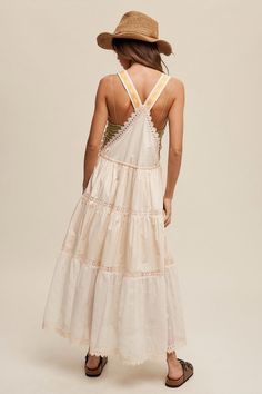 Introducing our Laced and Tiered Romantic Overall Maxi Dress, a stunning ensemble that exudes timeless elegance and femininity. This dress features a square neckline with adjustable jacquard shoulder straps for a personalized fit, while a delicate kangaroo pocket adorned with scallop crochet lace adds a whimsical touch. The tiered skirt boasts embroidered crochet lace contrast, accentuating the graceful movement of the garment.Model is 5' 7" wearing a size SmallFabric Contents: Self: 100% CottonContrast1: 100% CottonContrast2: 100% PolyesterLining: 80% Polyester 20% Cotton Non-stretch fabric Non-sheer fabric Care Instructions: Machine wash cold, gentle cycle, tumble dry low. Do not iron directly on prints or embellishments. Size Measurement (inch): S: 12.5 (Bust), 16.0 (Waist), 23.0 (Hips) Embroidered Crochet, Flannel Tops, Lace Hem, Lace Maxi Dress, Overall Dress, Skirt Design, China Fashion, Tiered Skirt, Sheer Fabrics