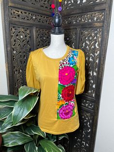 "Trendy Floral Embroidered Blouse - Artisan Made Embroidered Blouse - Chiapas, Mexico Beautiful hand embroidered blouse! This has been made and brought directly from Chiapas, Mexico. The blouse has extremely detailed embroidery. The embroidery is 100% handcrafted. All the work on this blouse has a professional skilled finish and the multicolor embroidered makes it look even more eye catching. The embroidery work is made with great quality thread. The eye catching will be on the embroidered work, Traditional Festive Tops With Embroidered Sleeves, Traditional Tops With Embroidered Sleeves For Festive Season, Festive Traditional Tops With Embroidered Sleeves, Traditional Yellow Embroidered Blouse, Festive Short Sleeve Top With Floral Embroidery, Traditional Multicolor Embroidered Top With Embroidered Sleeves, Yellow Embroidered Short Sleeve Blouse, Festivals Blouse Piece With Floral Embroidery And Short Sleeves, Short Sleeve Blouse Piece With Floral Embroidery For Festivals